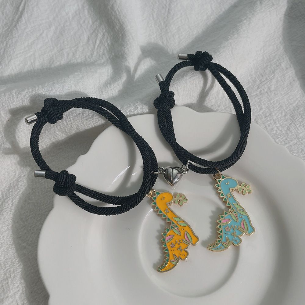 New Simple Cartoon Oil Dinosaur Iron-absorbing Love Couple Hands Carrying Strap