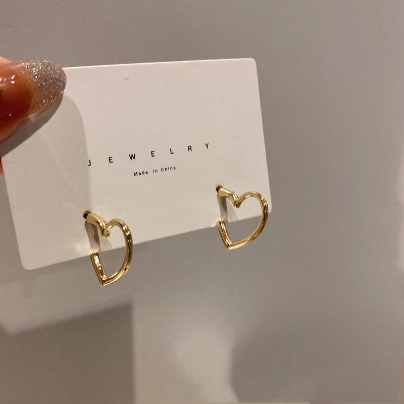 Women's Fashion Simple Hollowed Heart Shape Earrings